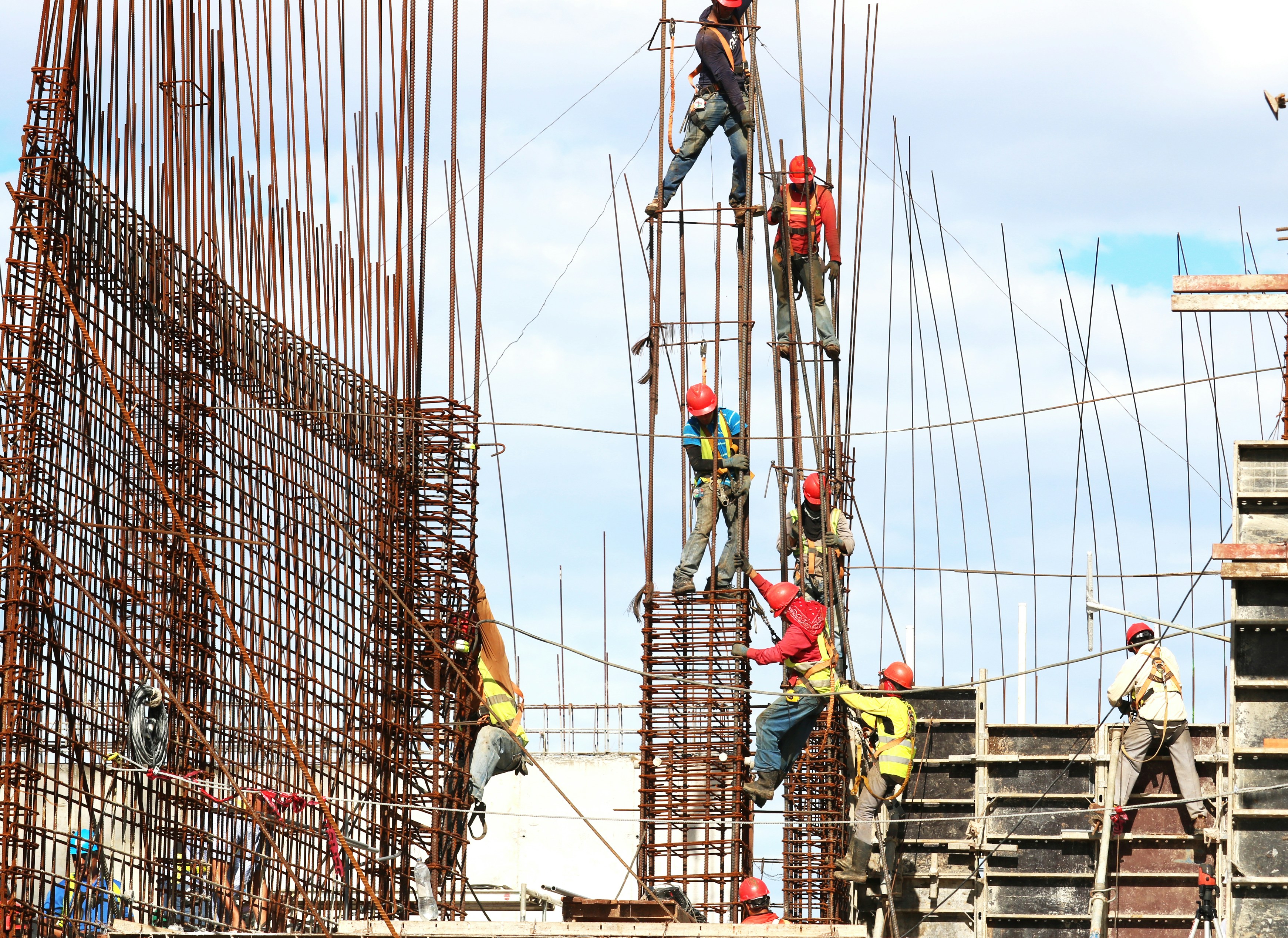 Reinforcement work coordinated on an active construction site.
